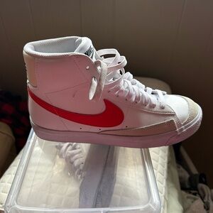 Nike White High-Top Sneakers with Red Swoosh
